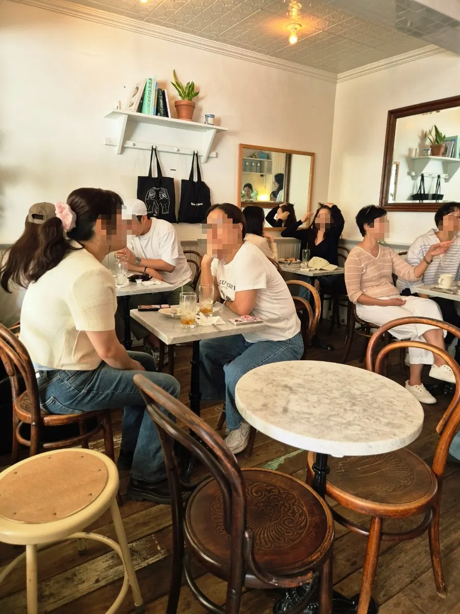Open-air café seating with small tables