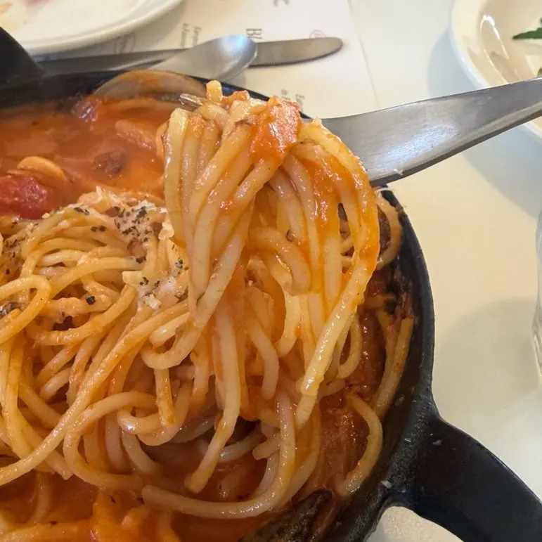 Seafood tomato ttukbaegi pasta