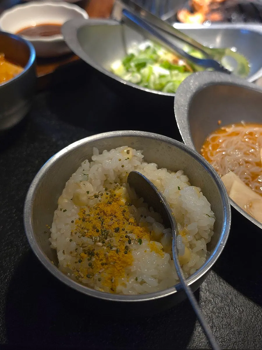Pot rice mixed with butter and curry powder