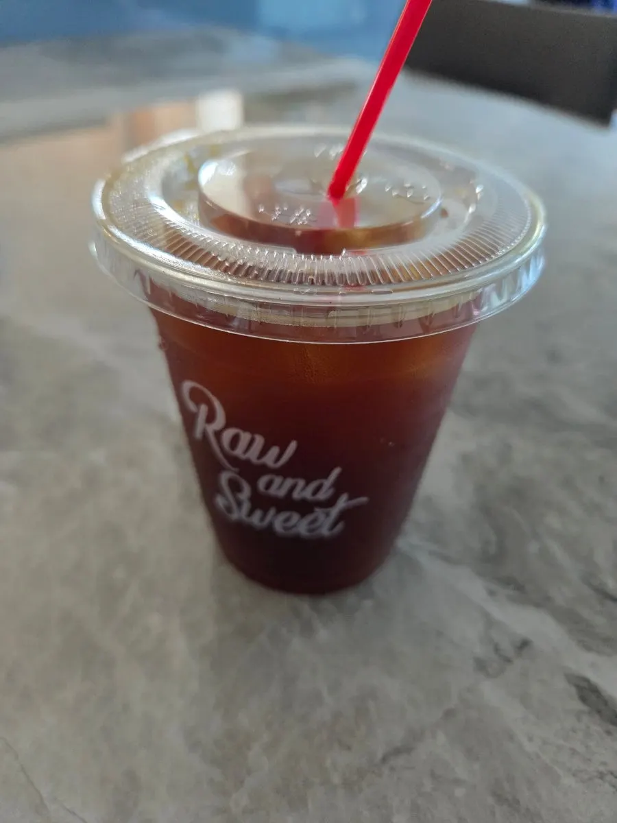 Packed decaf americano to go