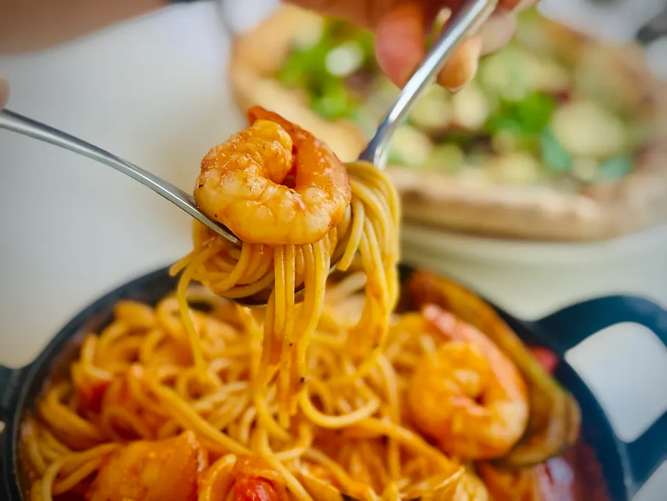 Tomato pasta with shrimp and clams