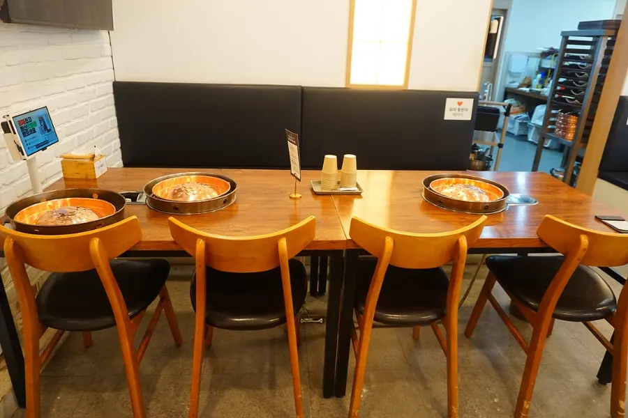Dining table set with a grill