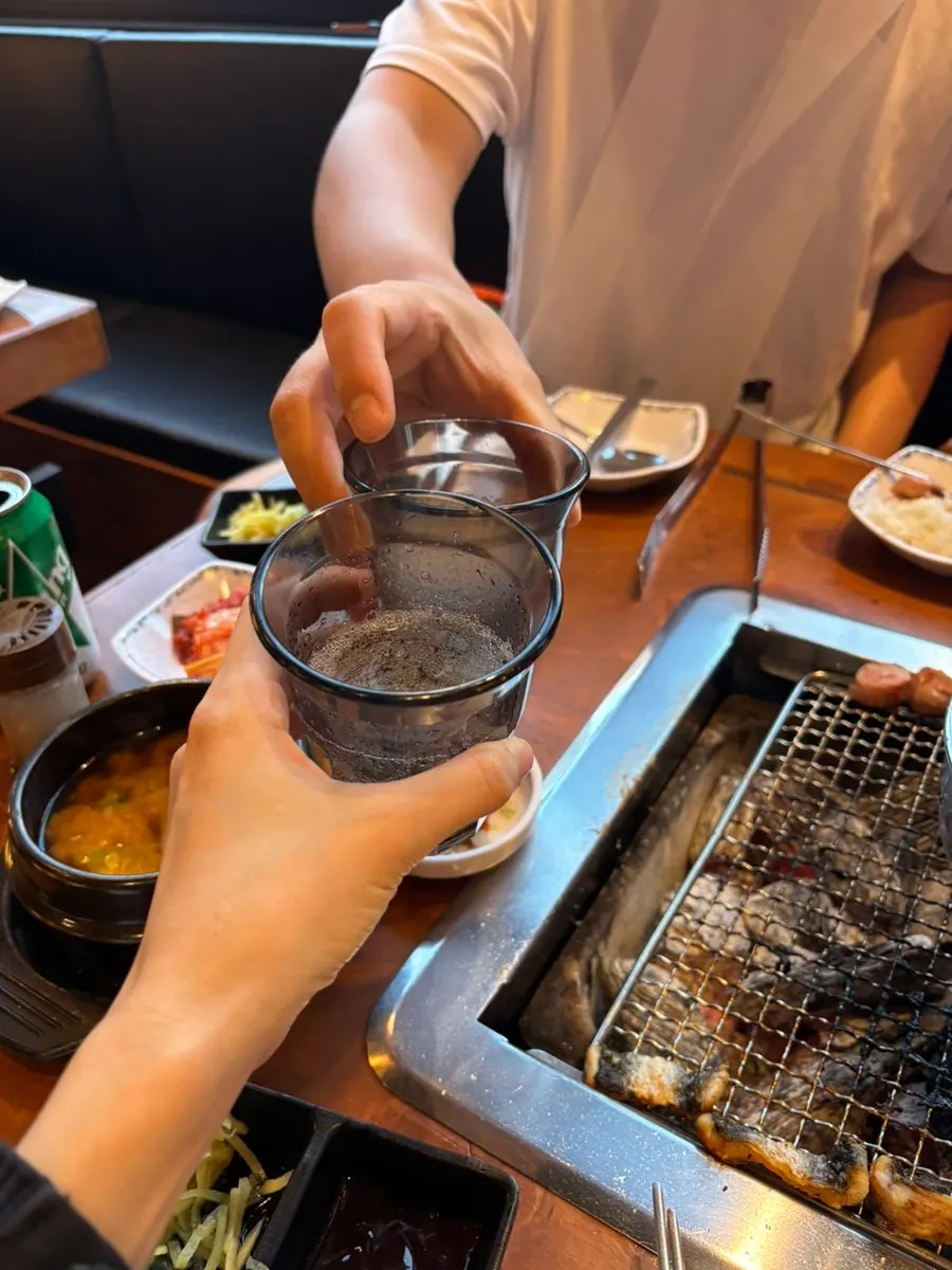 Cheers with cider during the eel meal