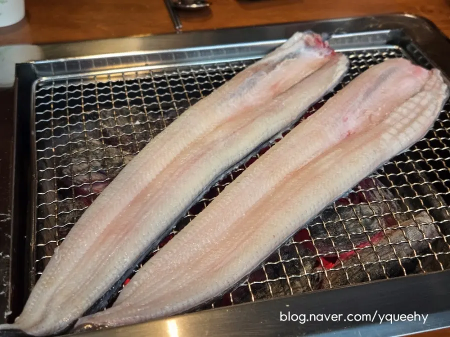 Eel grilling on the grate