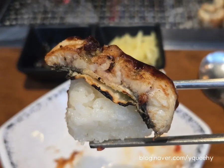 Eel served over stone-pot sushi