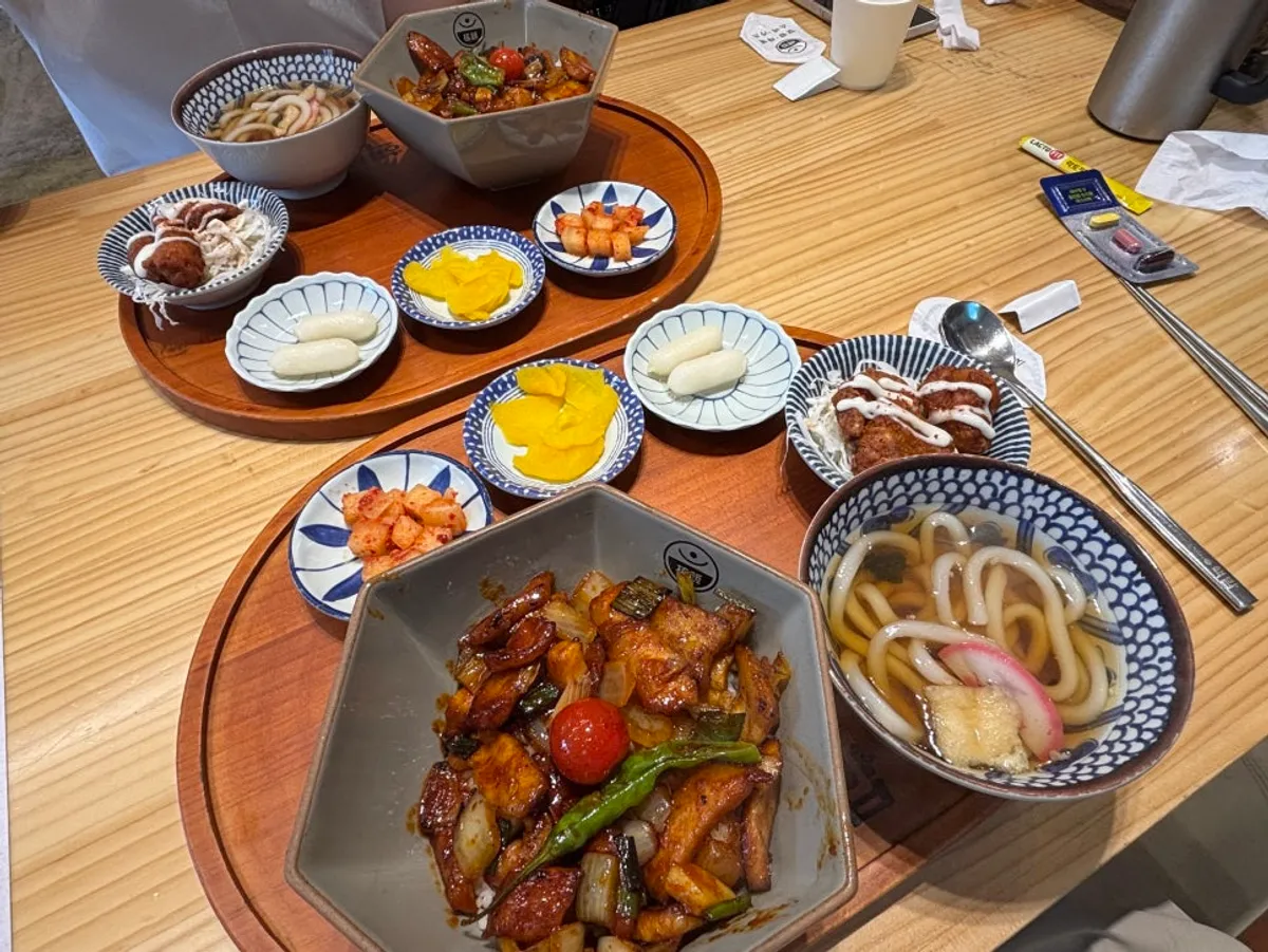 Tablet screen showing curry rice bowls and katsu dishes