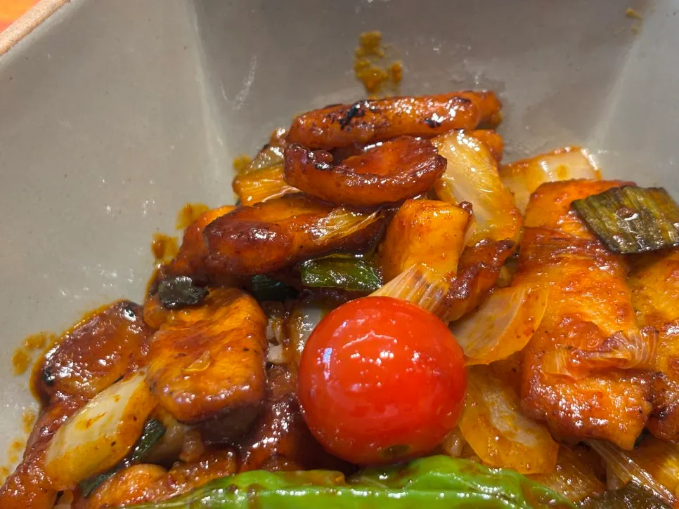 Bowl of spicy sauced pork jowl rice bowl