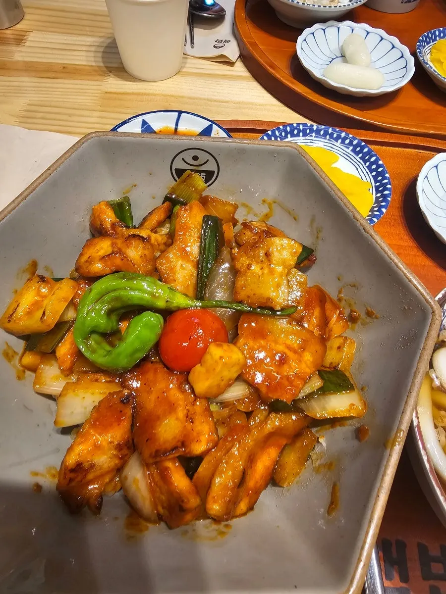 Ordered pork jowl rice bowl and beef intestine rice bowl set on the table