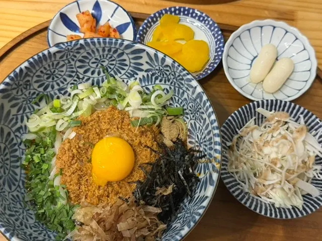 Mazesoba topped with an egg yolk