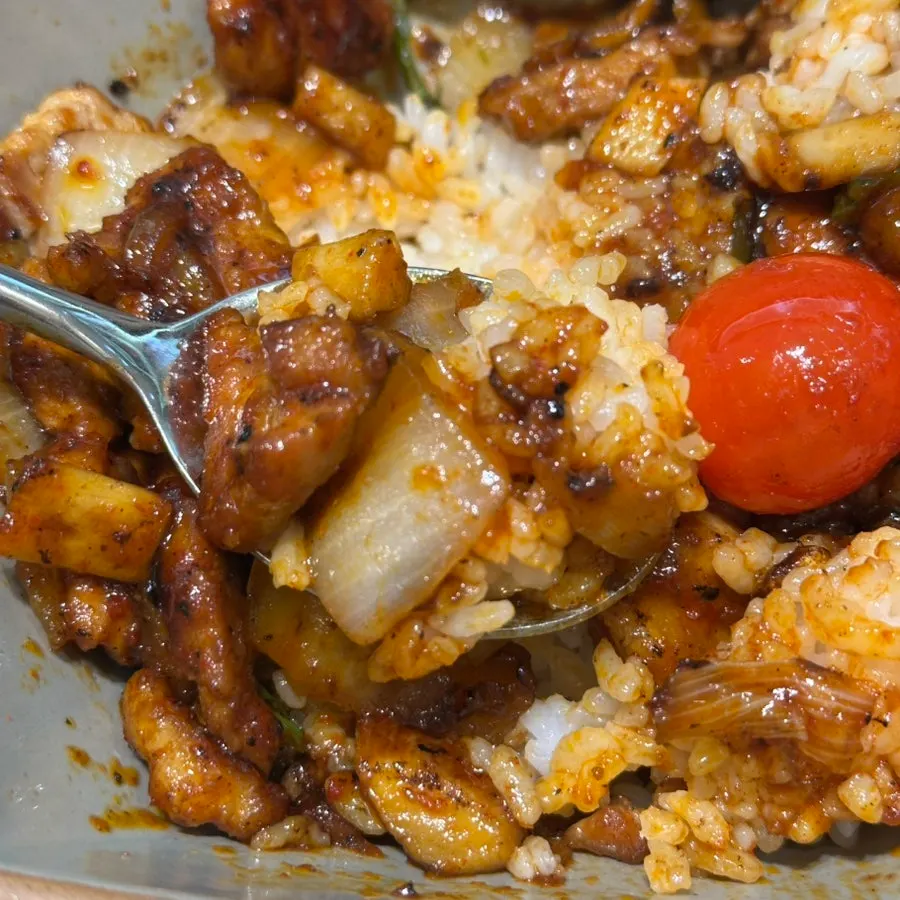 Spicy pork rice bowl mixed with rice