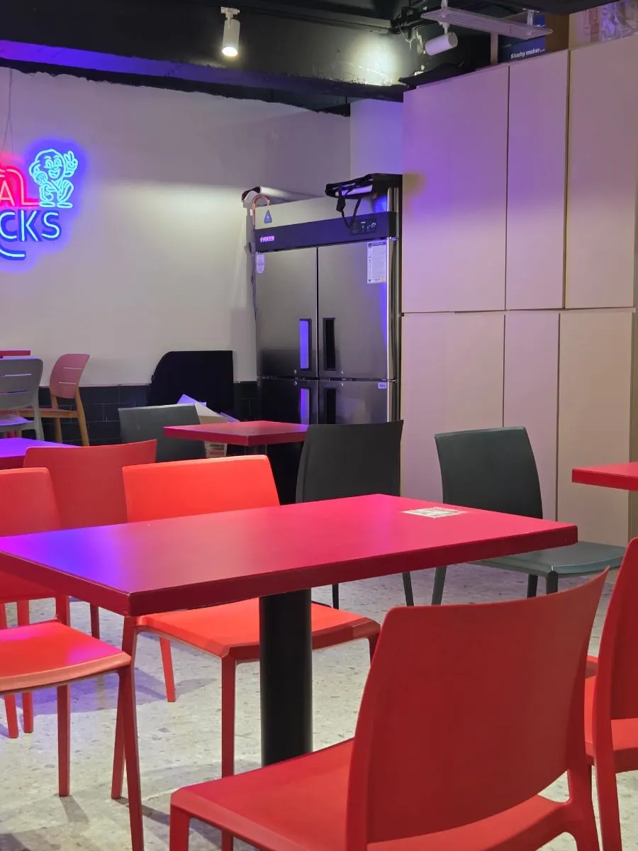 Halal Steaks seating with single seats by the window