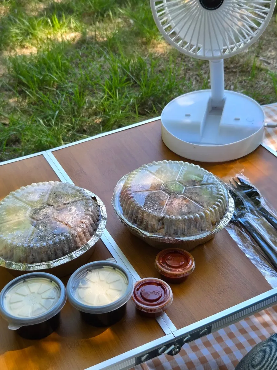 Takeout bags with chicken platter and combo platter