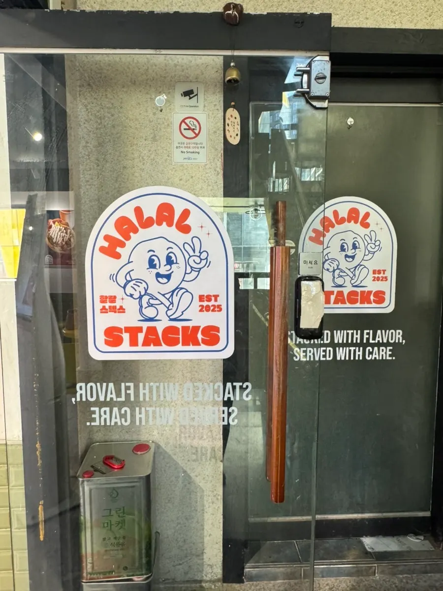 Exterior of Halal Steaks on the 2nd floor of the building across from A-Land near Hongik University Station