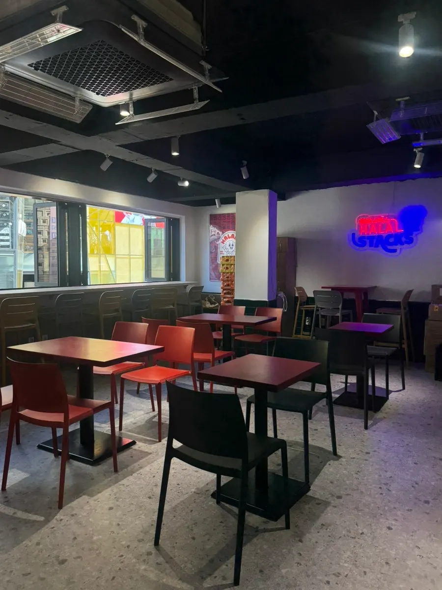Group tables and window bar seating at Halal Steaks