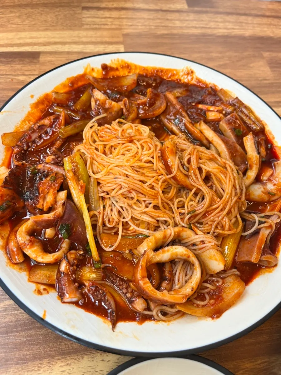 A bite-sized piece of whole squid stir-fry