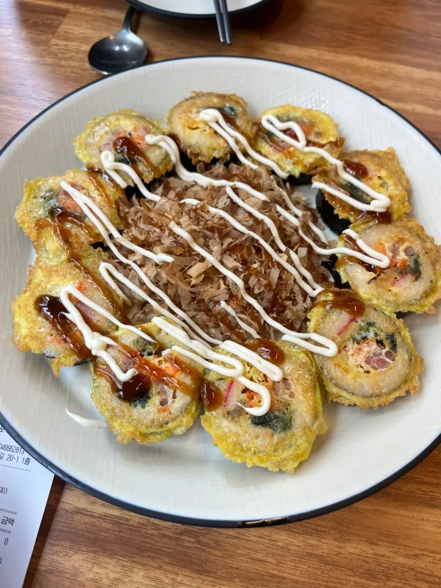 Cross-section of golden, well-cooked gimbap-jeon
