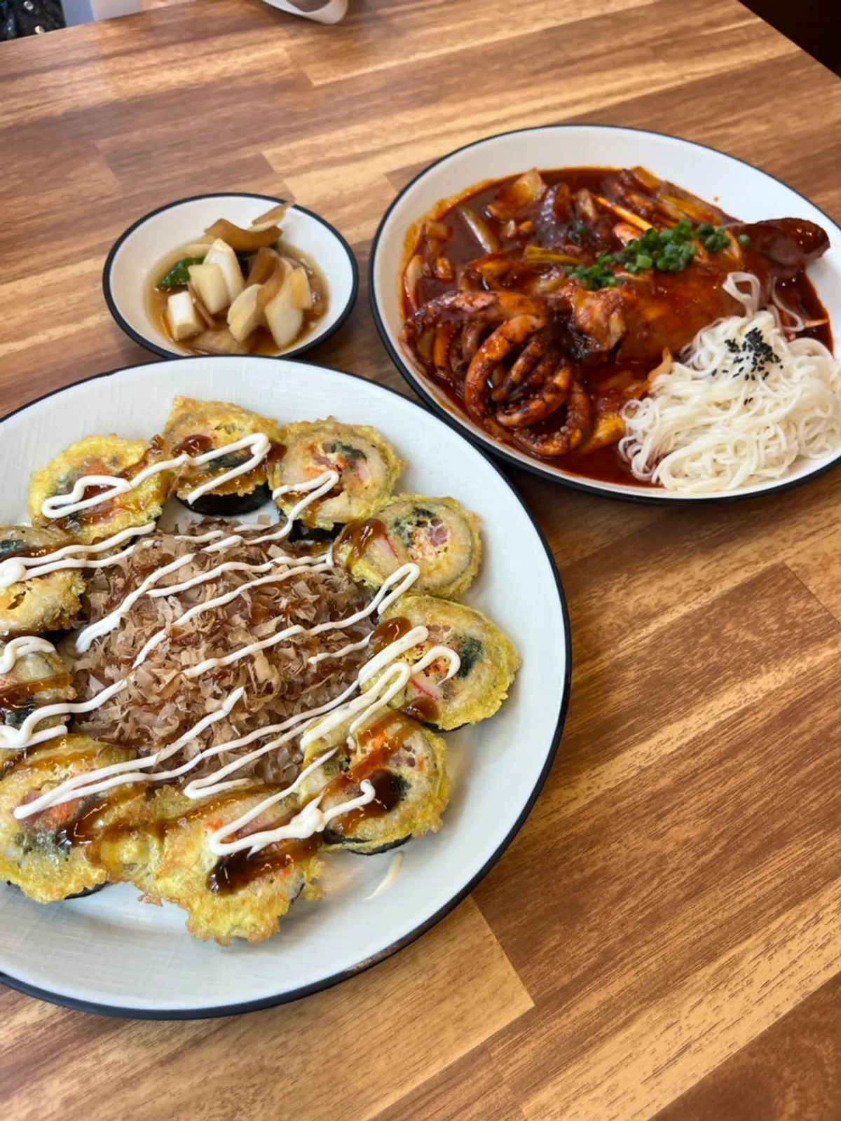 Gimbap-jeon dipped in squid stir-fry sauce