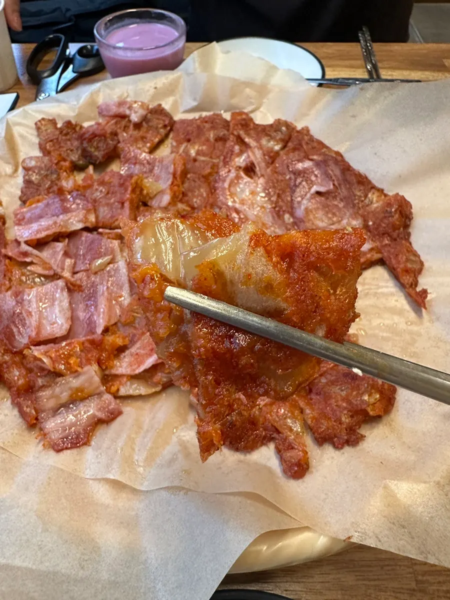 Cross-section of the jeon loaded with kimchi and bacon