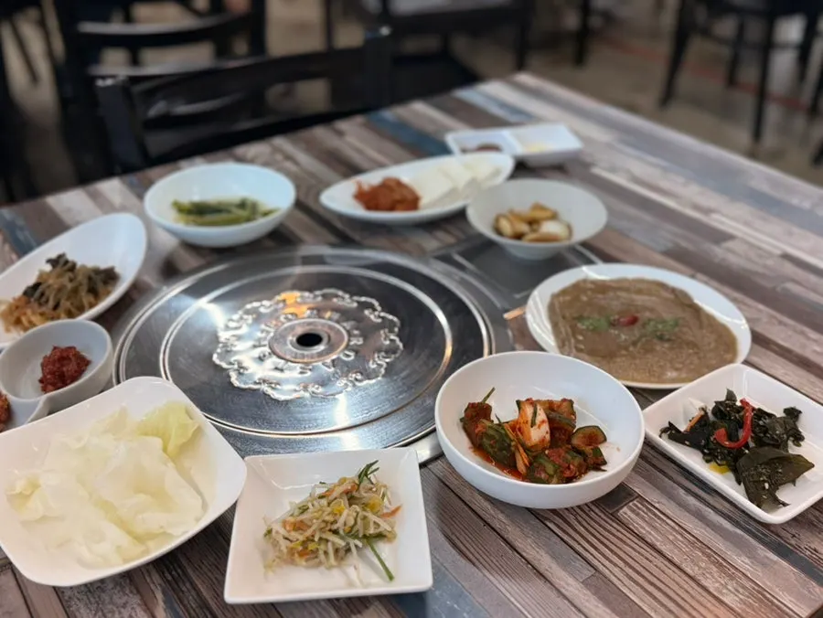 Sotbap set meal spread and side dishes