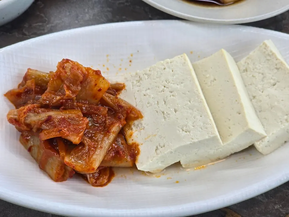 Boiled pork slices served with the Korean set meal
