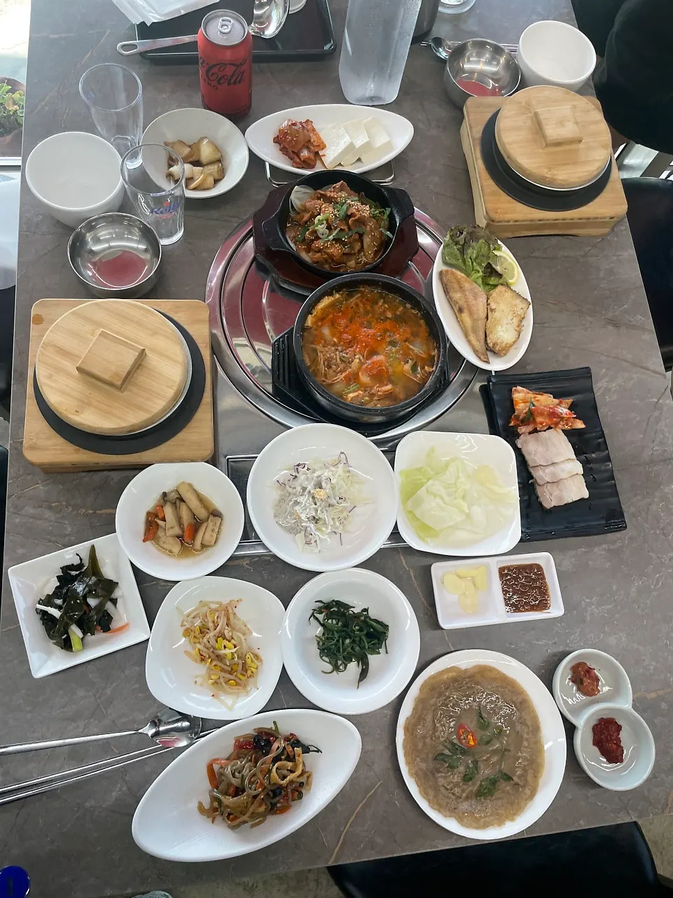 Full spread with jeyuk-bokkeum, grilled fish, and stew