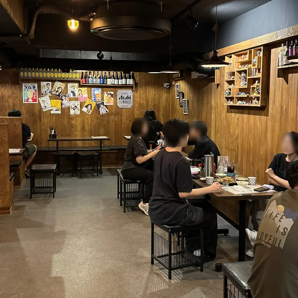 Interior of Hamaru Hoegi lined with Japanese sake bottles