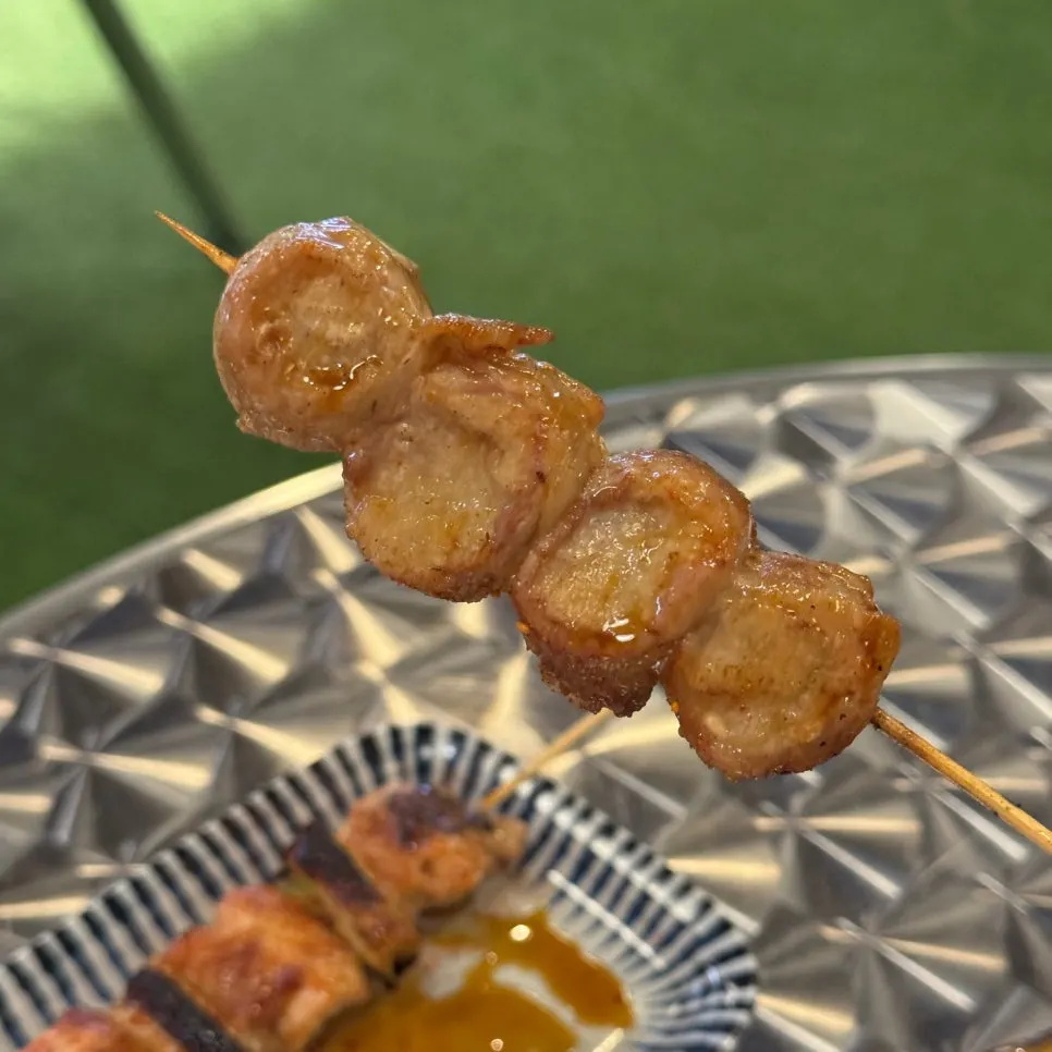 Enoki mushrooms grilled wrapped in pork belly