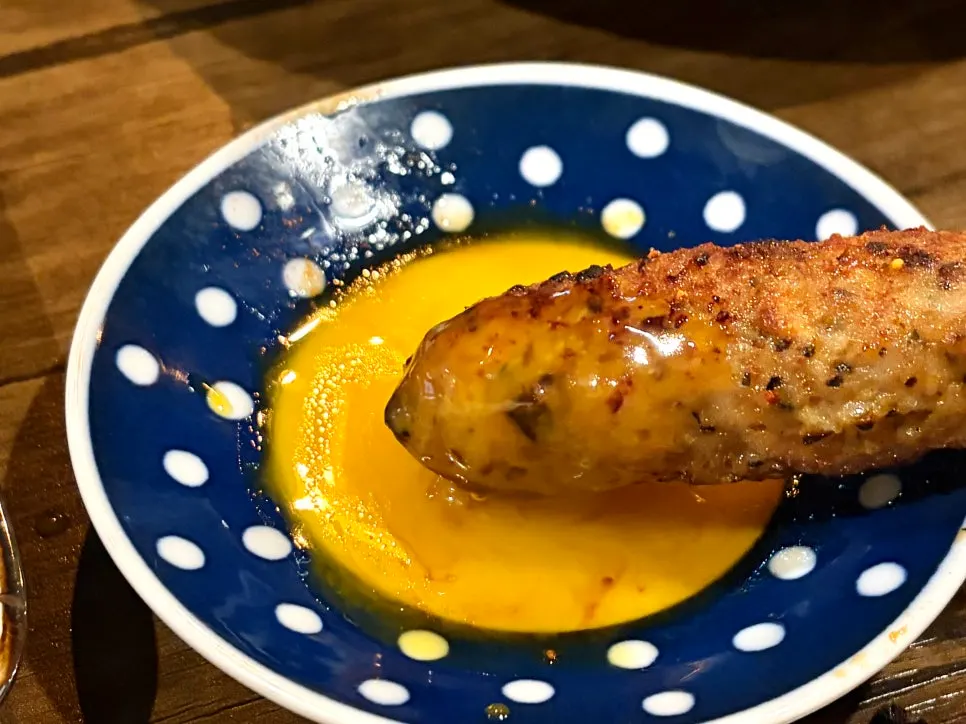 Tsukune skewer with egg yolk