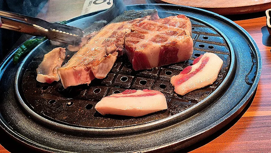 Cross-section of golden grilled black pork