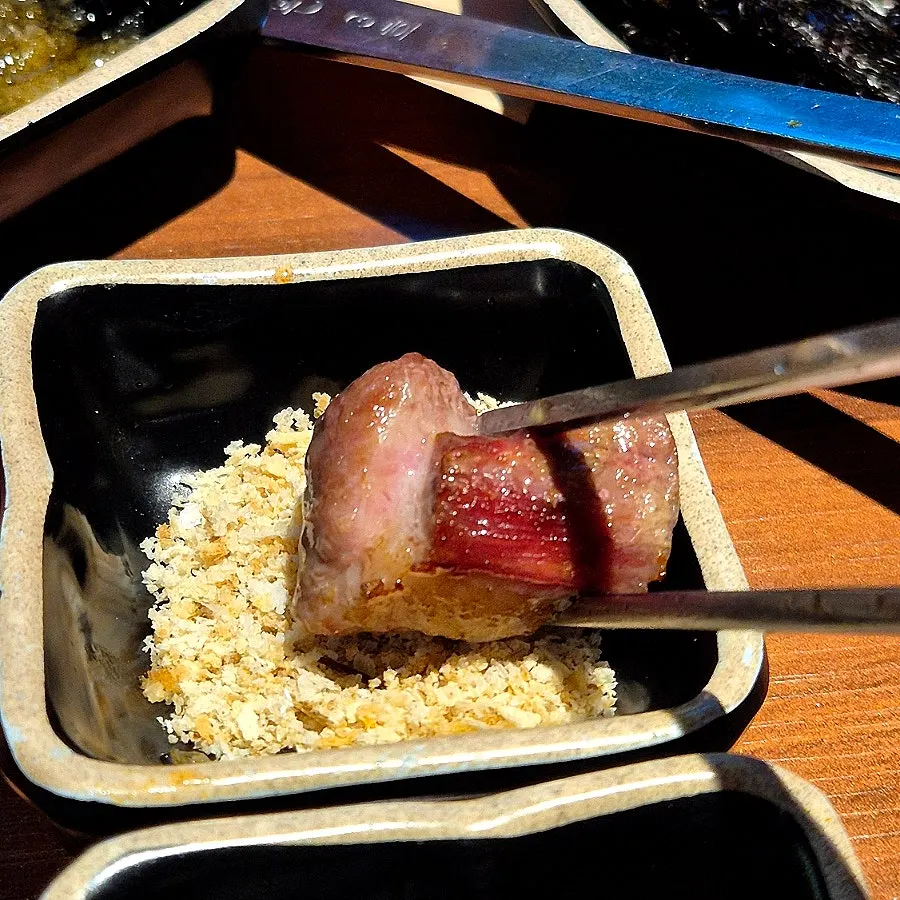 Grilled aged kimchi and pork on the grill