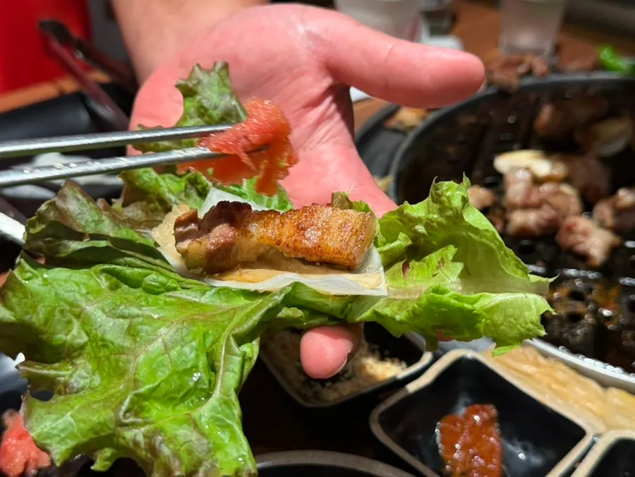 Black pork wrap topped with salted pollack roe
