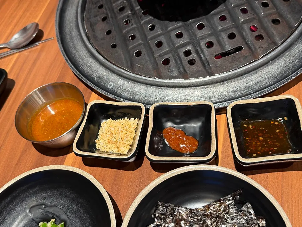 Accompanying sauces including meljeot and Maldon salt