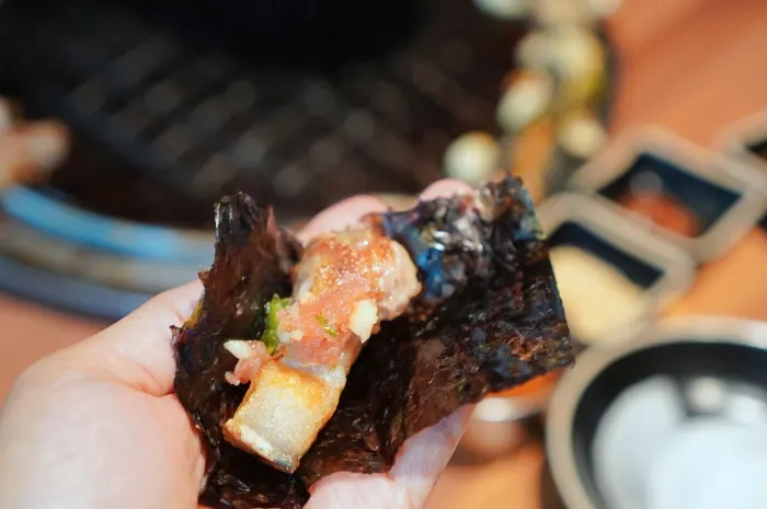 Kim-ssam wrap with meat and salted pollock roe