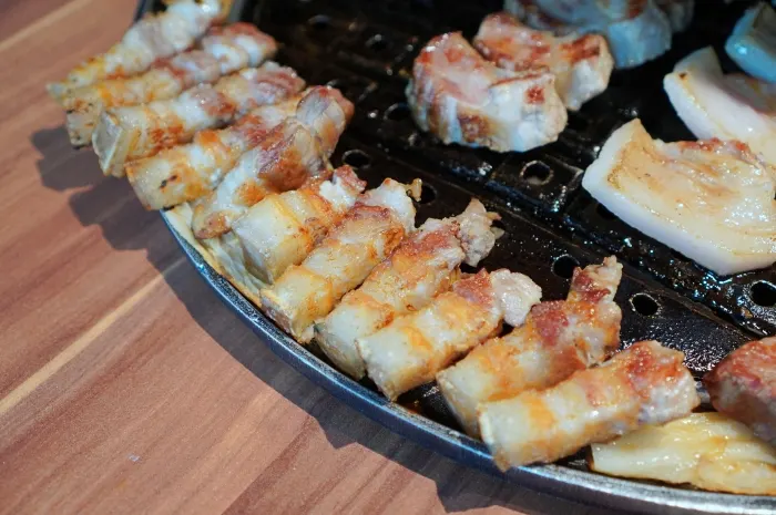 A spread of black pork with carefully paired sauces