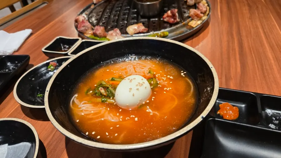 Hamdeok black pork with pollack roe and seaweed pairing, and cold noodles, at Jeju Samchun
