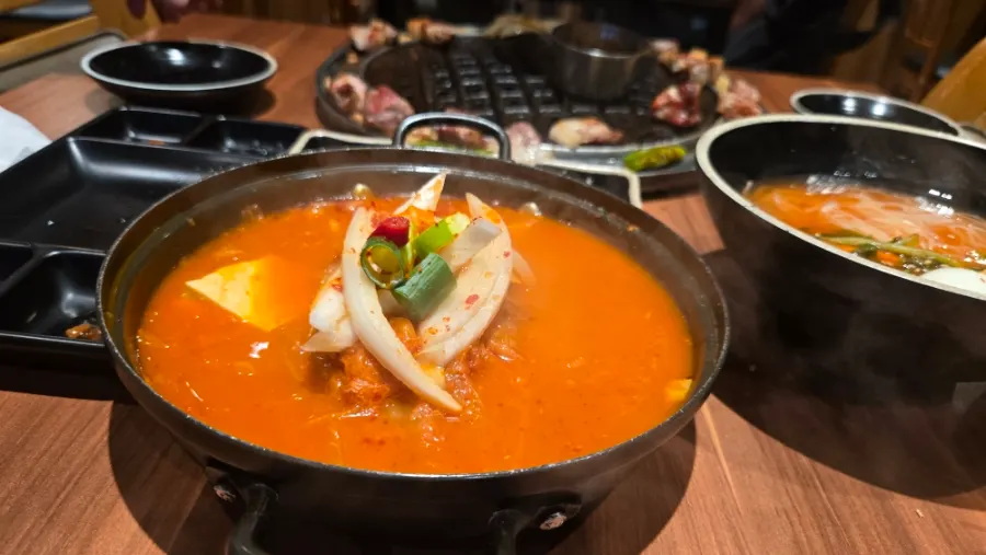 Hamdeok black pork with pollack roe and seaweed pairing, and cold noodles, at Jeju Samchun
