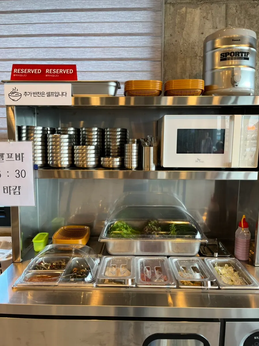 Self-serve bar corner at Jeju Seom Godeungeo Ssambap
