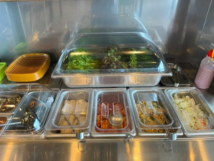 Various wrap vegetables prepared at the self-serve bar