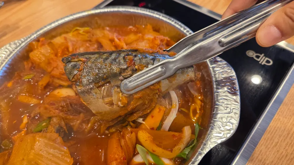 Enjoying a mackerel ssambap meal