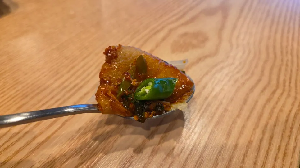 A chewy bite of black pork duruchigi