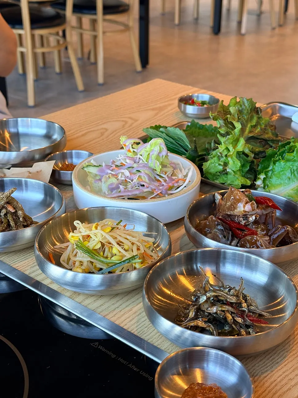 Pot of aged-kimchi braised mackerel with chunks of fish
