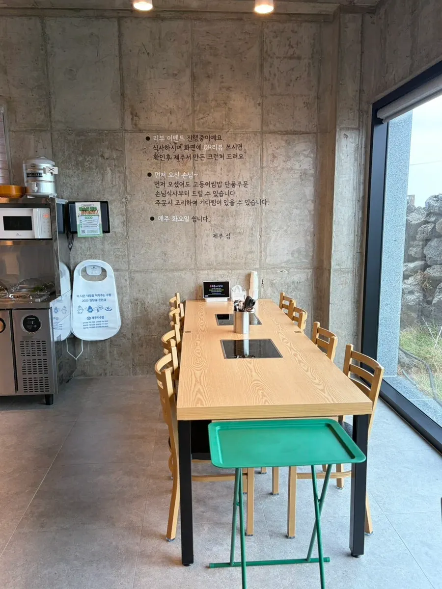 Clean restaurant interior with seating for larger groups