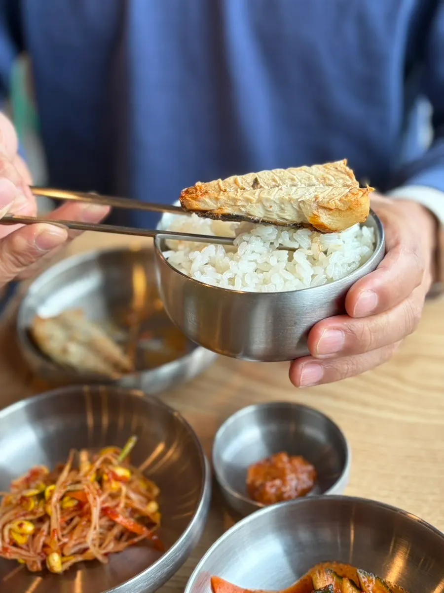 A spoonful combining mackerel and kimchi