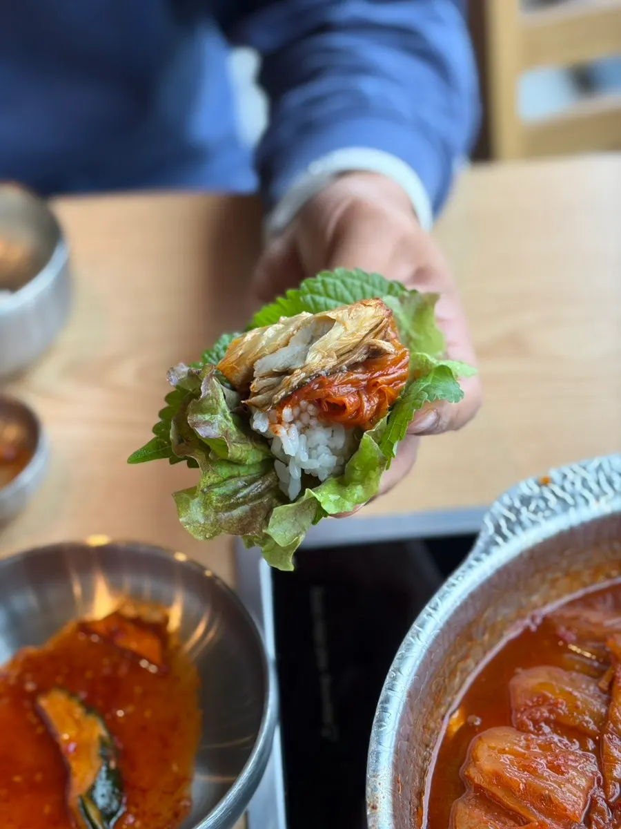 Finished mackerel kimchi stew table setting and restaurant view
