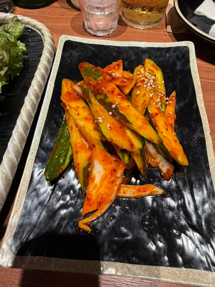 Salted pollock roe, aged kimchi, seaweed, and pickled radish side dishes