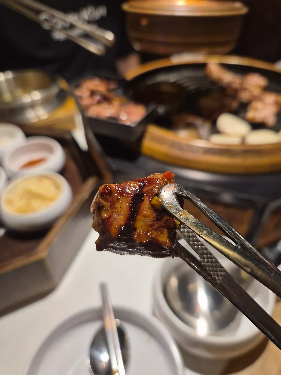 Aged pork neck wrapped in lettuce
