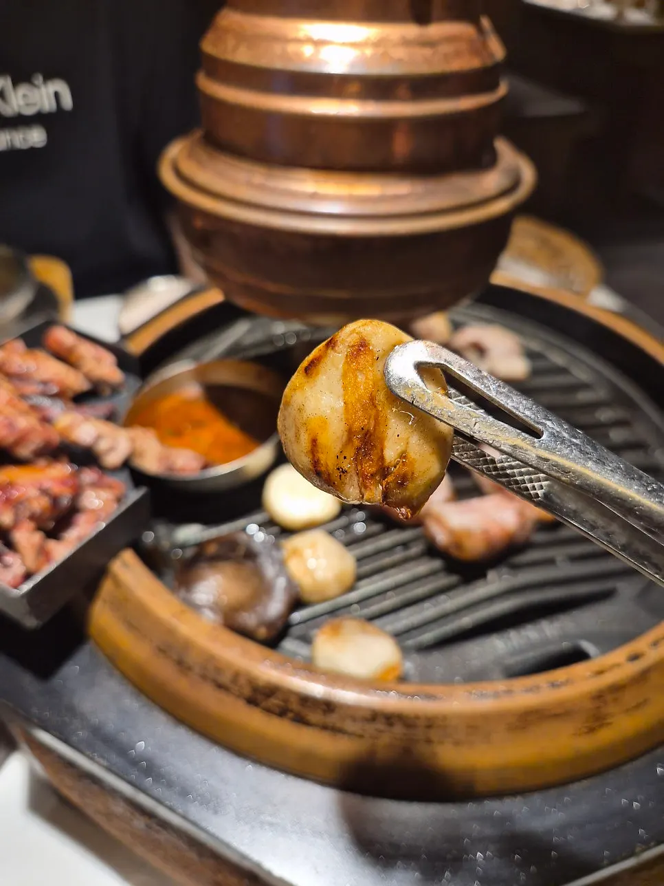 Thick cross-aged pork belly on the grill