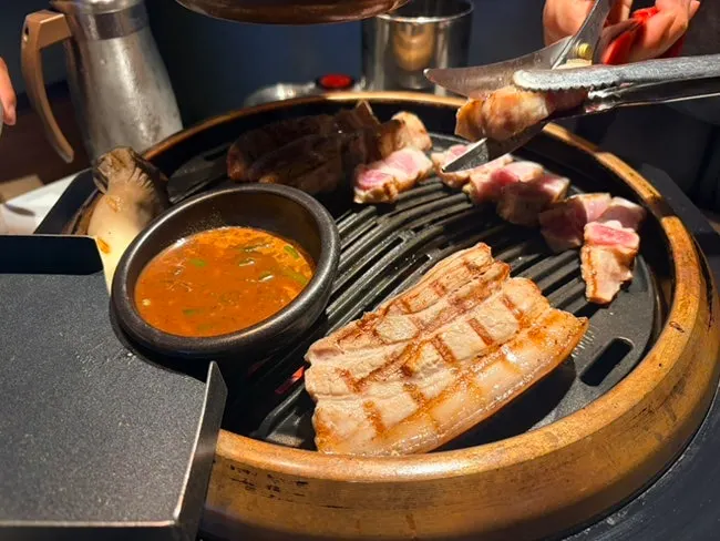 Full table spread with meat and bone soup