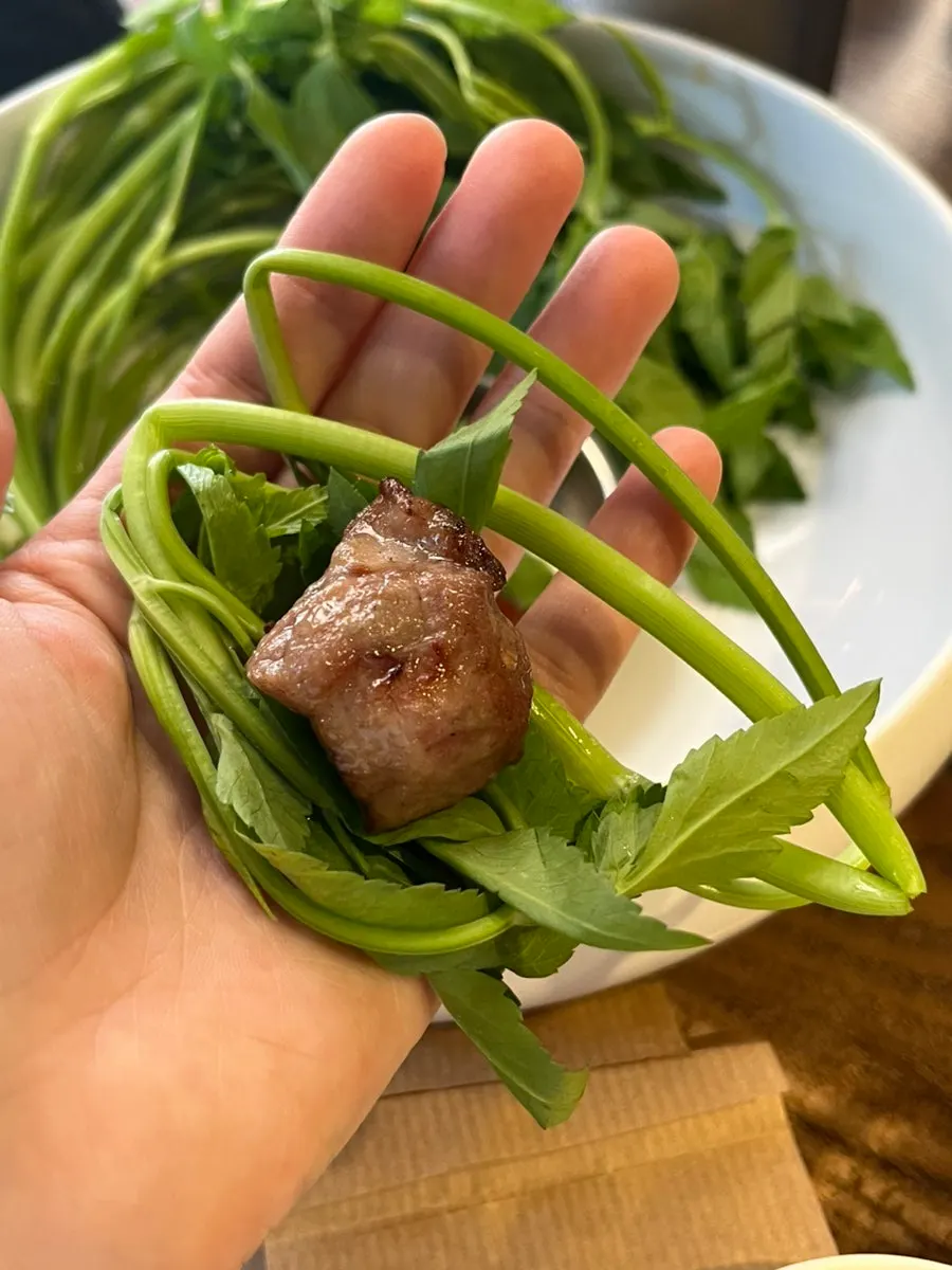 Fresh minari served in place of lettuce for wraps
