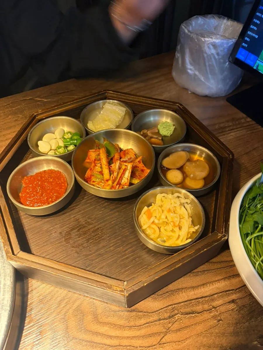 Plate of raw minari served as a complimentary side
